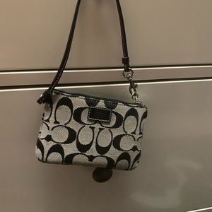 Super cute Coach Wristlet. Excellent condition.